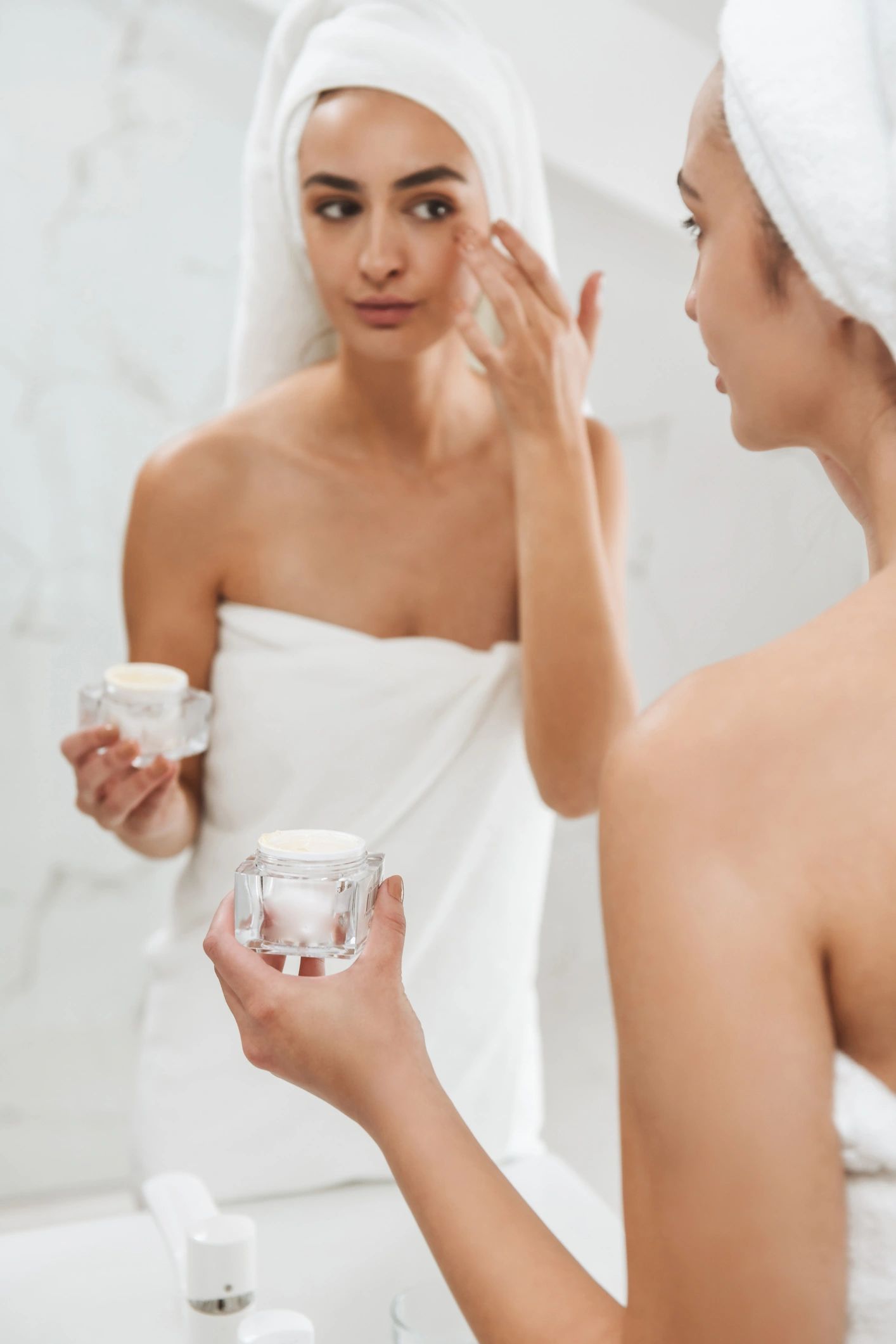 Woman enjoying a calming skincare routine