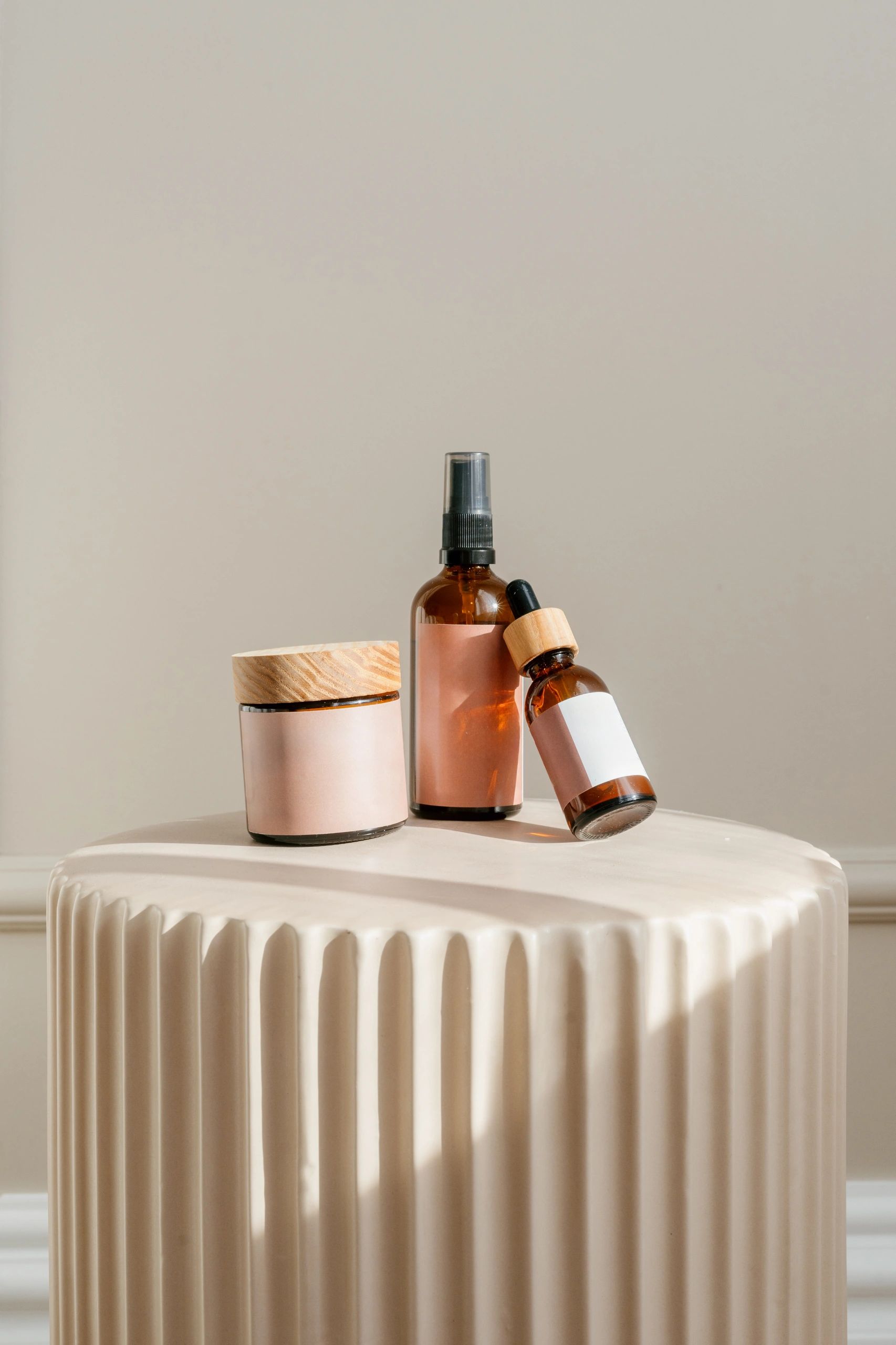 Beauty skincare products displayed on a pedestal